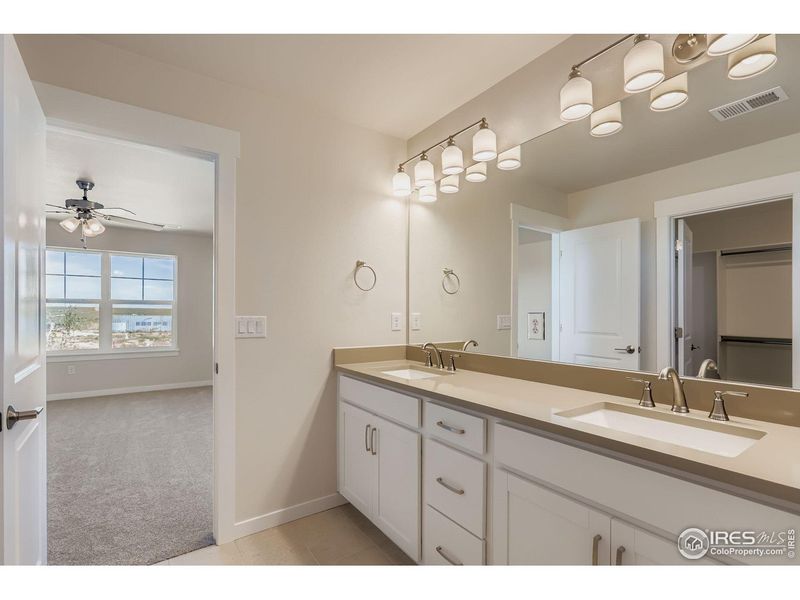 Furnished interior view inside a new home in Barefoot Lakes, Firestone (Image 6). Furnished interior view inside a new home in Barefoot Lakes, Firestone (Image 6).