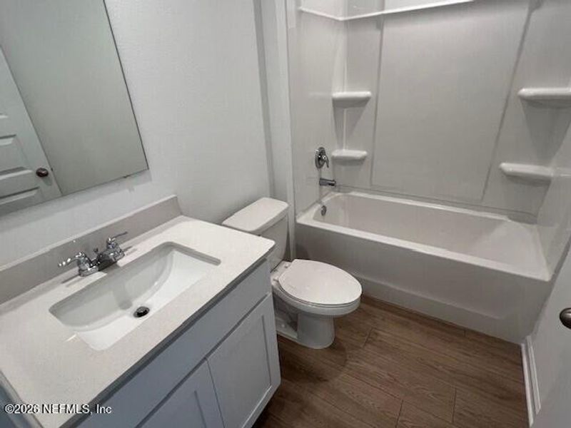 Furnished interior view inside a new home in Sawmill Branch, Palm Coast (Image 6).