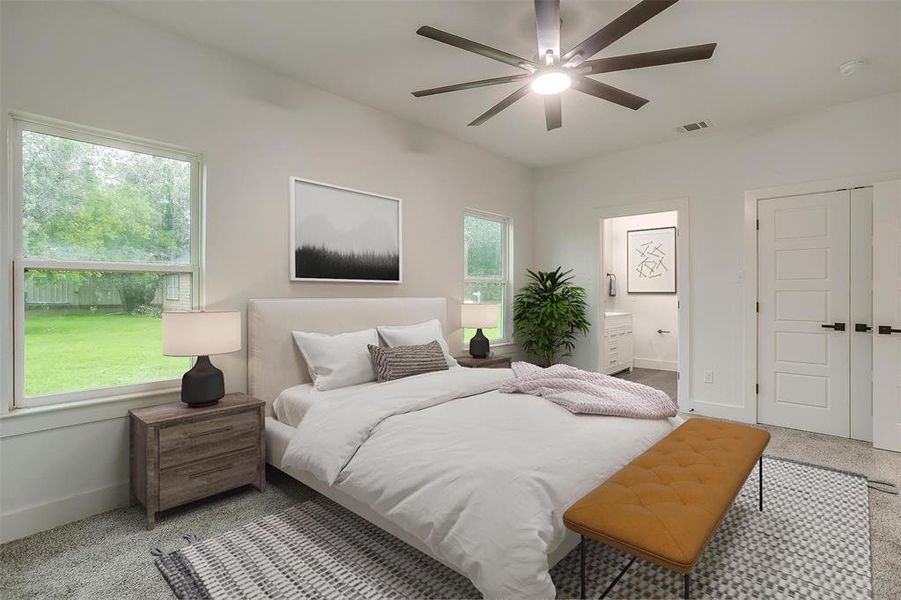 Bedroom featuring ensuite bathroom and a ceiling fan