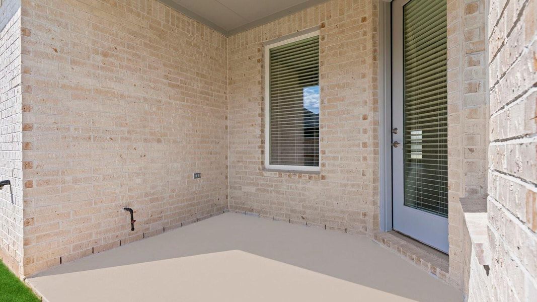 Exterior details and patio area of a home in Harvest Green, Richmond (Image 3).