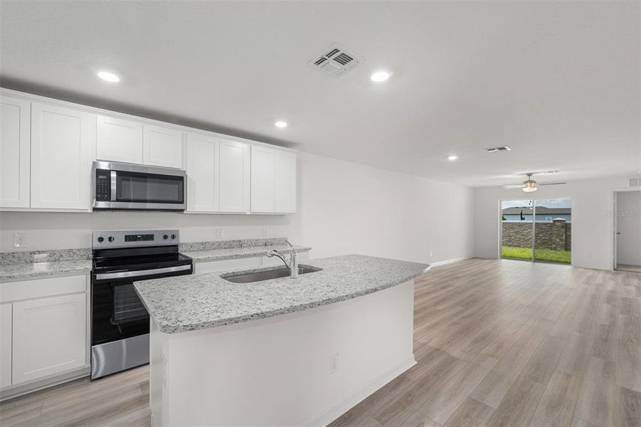 Furnished interior view inside a new home in Gum Lake Preserve, Lake Alfred (Image 8).