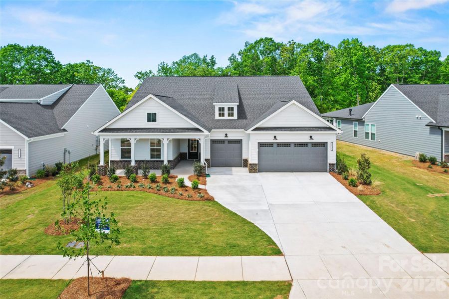 Front exterior of a new home in Carolina Riverside, Belmont, NC, highlighting curb appeal (Image 27).