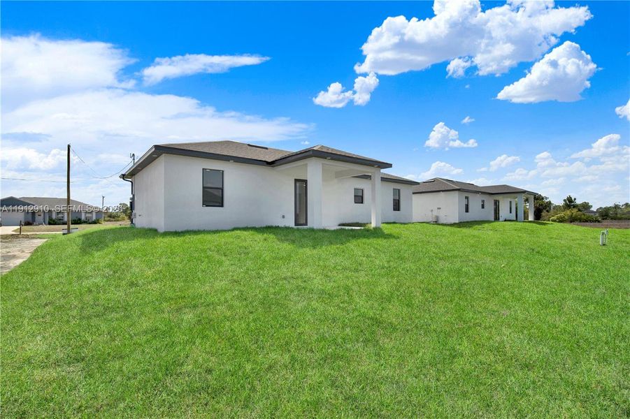 Exterior details and patio area of a home in , Lehigh Acres (Image 4).