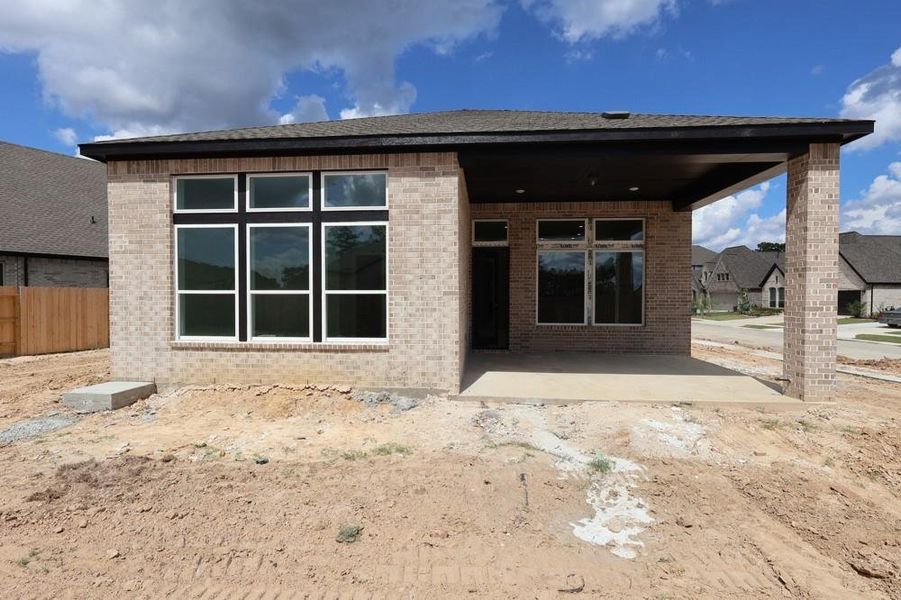 Exterior details and patio area of a home in ARTAVIA 45' Homesites, Conroe (Image 3).