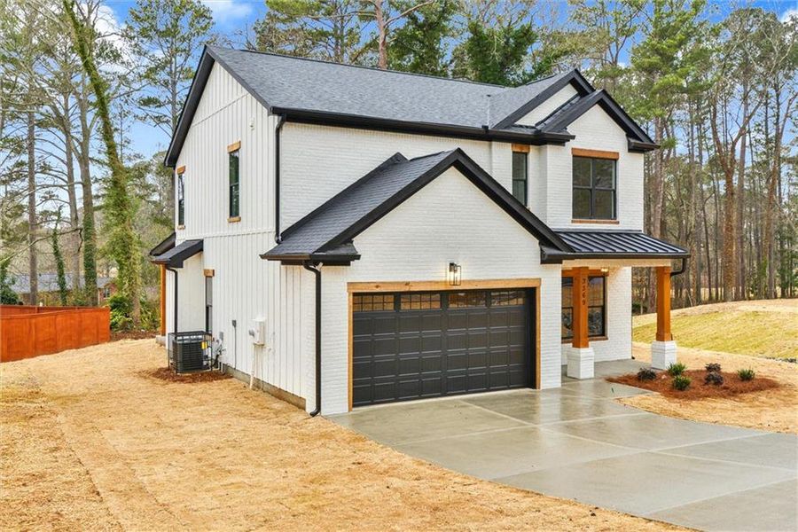 Front exterior of a new home in , Atlanta, GA, highlighting curb appeal (Image 21).