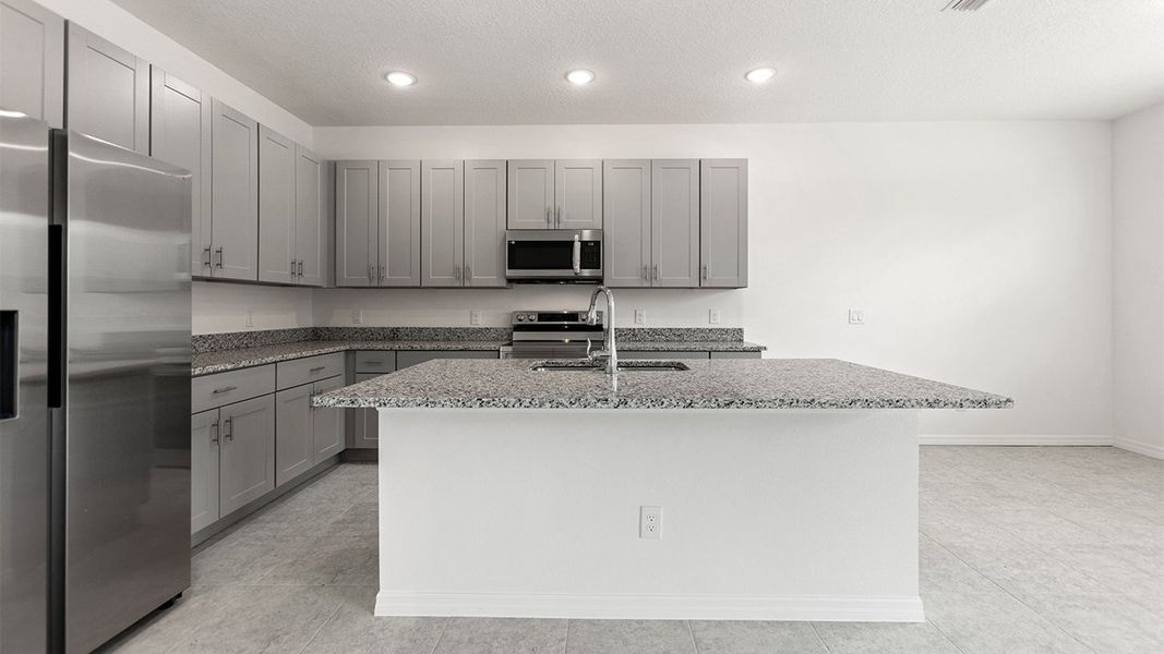 Representative furnished interior of a home built from the Aspire by Park Square Residential in Leela Reserve, Tavares (Image 5).