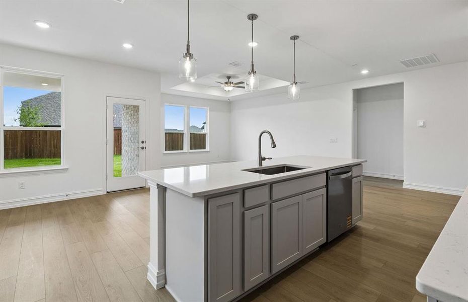 Beautiful kitchen with pendent lighting