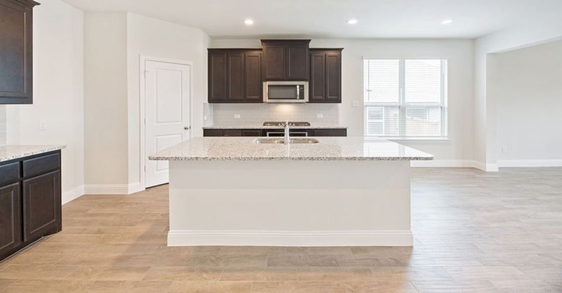 Representative exterior photo of a completed home built from the Stirling by Impression Homes in Timberbrook, Justin, TX (Image 2). Representative exterior photo of a completed home built from the Stirling by Impression Homes in Timberbrook, Justin, TX (Image 2).