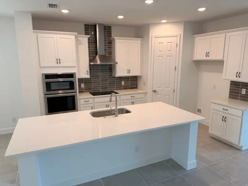 Furnished interior view inside a new home in Harrell Oaks, Orlando (Image 3).