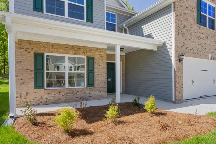 Exterior details and patio area of a home in Avondale, Greensboro (Image 3). Exterior details and patio area of a home in Avondale, Greensboro (Image 3).