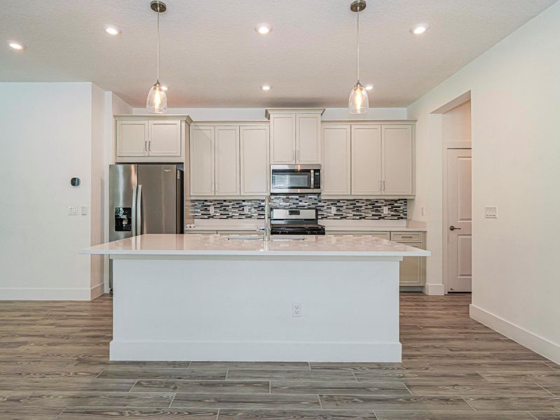 Furnished interior view inside a new home in , Port St. Lucie (Image 6).