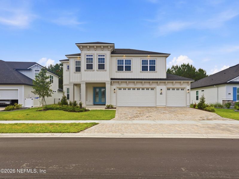 Front exterior of a new home in Silver Landing At Silverleaf, St. Augustine, FL, highlighting curb appeal (Image 26).