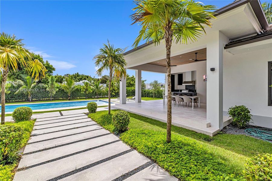 Front exterior of a new home in , Pinecrest, FL, highlighting curb appeal (Image 2).
