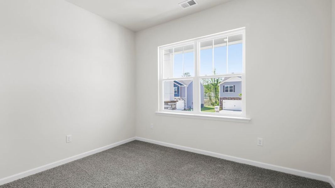 Spacious, unfurnished interior of a new home in Durbin Meadows Traditions, Fountain Inn (Image 14).