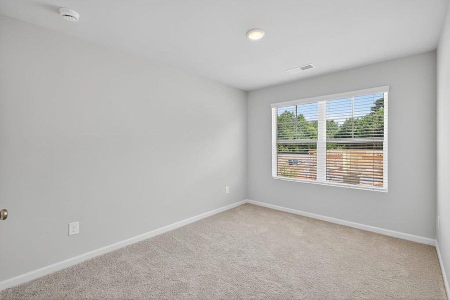 Spacious, unfurnished interior of a new home in The Reserve at Clocktower, Douglasville (Image 17).