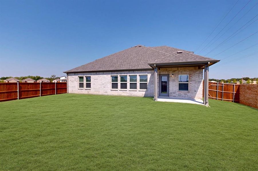 Front exterior of a new home in Kings Way, Denton, TX, highlighting curb appeal (Image 20).
