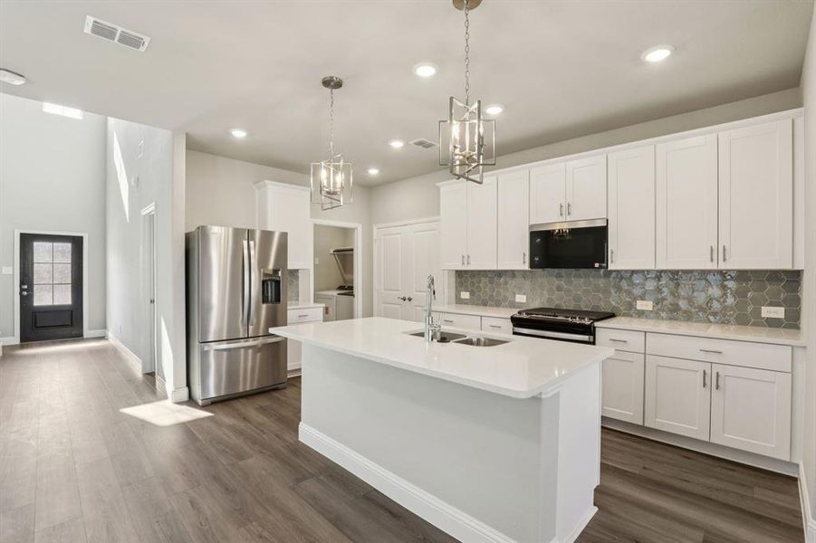 Photo is not of the actual home, but is an inspirational photo of builder’s model home and may depict options, furnishings, and/or decorator features that are not included.