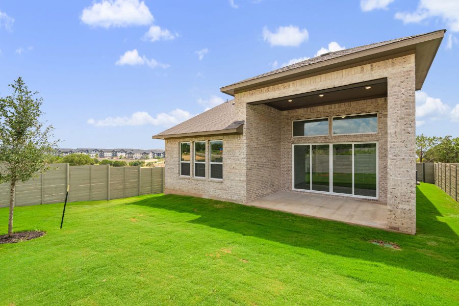 Exterior details and patio area of a home in Wolf Ranch, Georgetown (Image 25).