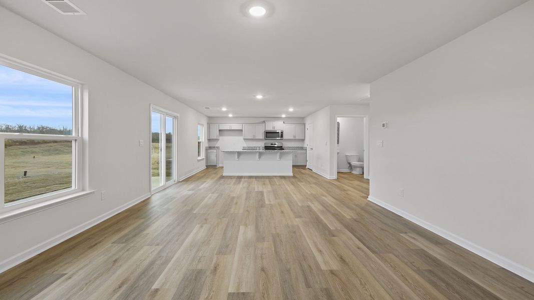 Spacious, unfurnished interior of a new home in Bentley Park, Greenwood (Image 18).