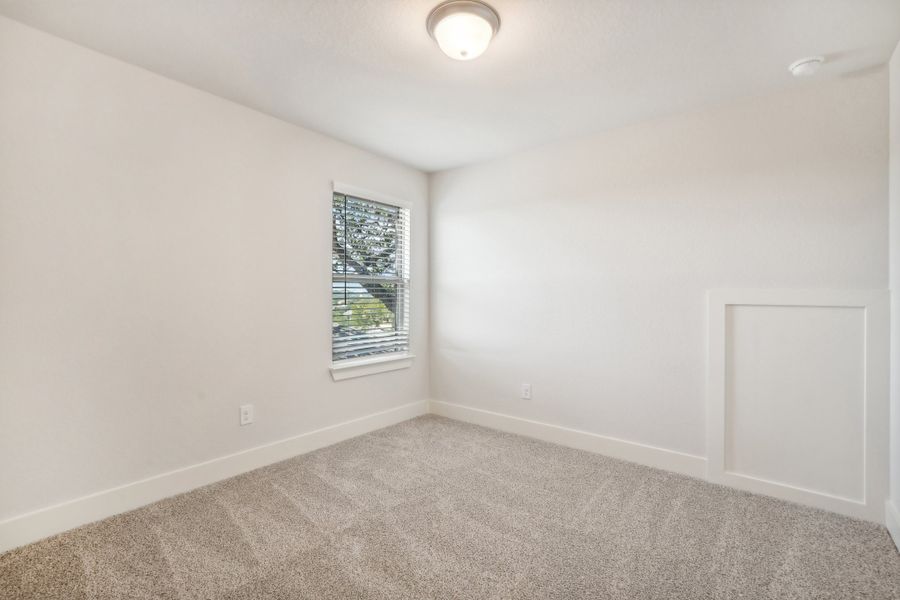 Guest bedroom in the Medina floorplan at a Meritage Homes community.