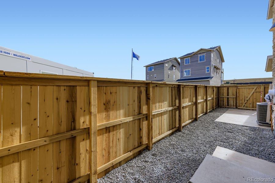 Exterior details and patio area of a home in Uplands, Westminster (Image 18).