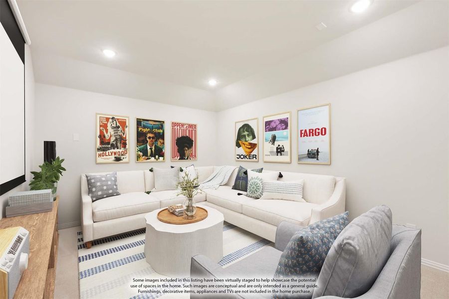 Media room with large projection screen, sectional sofa, and movie posters on the wall
