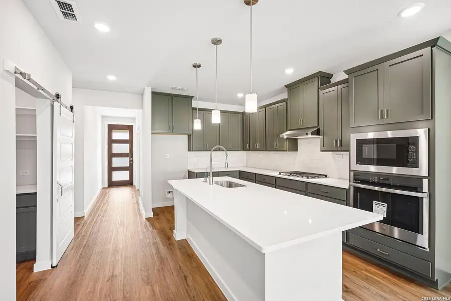 Furnished interior view inside a new home in Weston Oaks, San Antonio (Image 11).