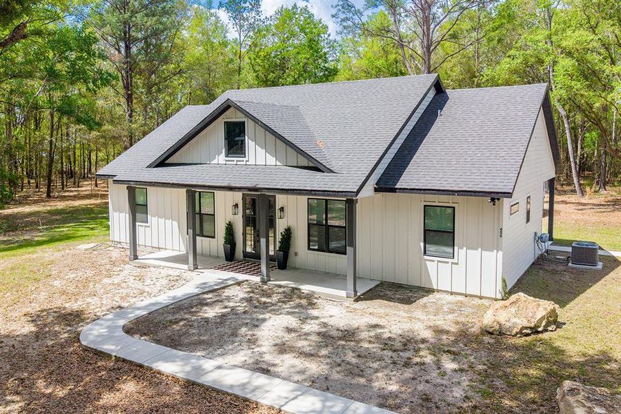 Exterior details and patio area of a home in , Fort White (Image 26).