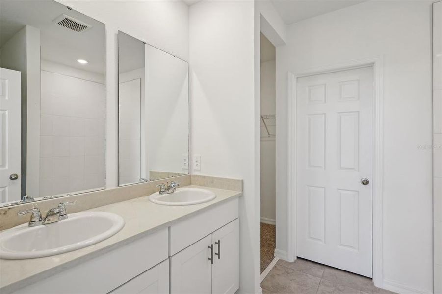 Furnished interior view inside a new home in Lake Deer Estates - Signature Series, Poinciana (Image 13). Furnished interior view inside a new home in Lake Deer Estates - Signature Series, Poinciana (Image 13).