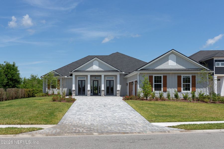 Front exterior of a new home in , Fruit Cove, FL, highlighting curb appeal (Image 20).