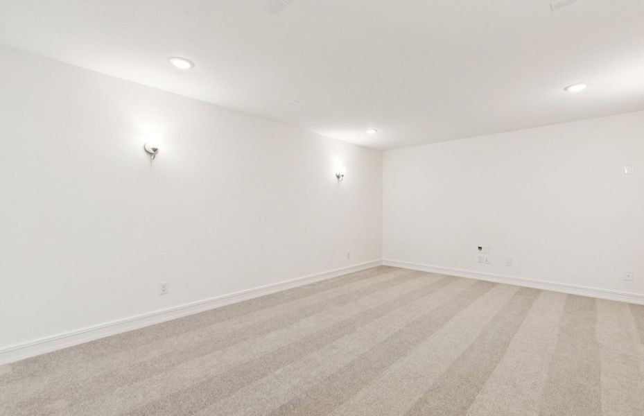Deep media room perfect for movie nights and entertainment  *Real home pictured