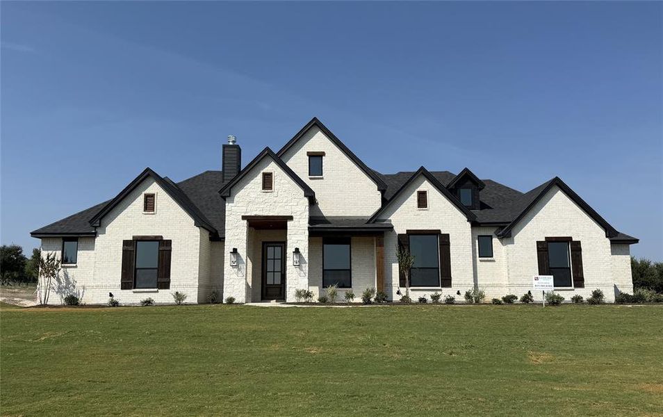 Front exterior of a new home in Aledo Heights - Aledo ISD, Aledo, TX, highlighting curb appeal (Image 2). Front exterior of a new home in Aledo Heights - Aledo ISD, Aledo, TX, highlighting curb appeal (Image 2).