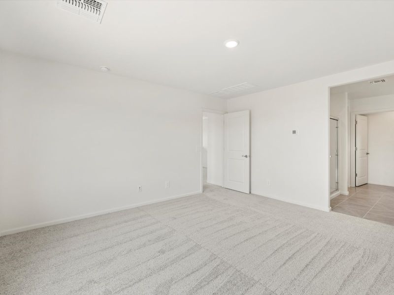 Spacious, unfurnished interior of a new home in Mandarina - Signature Series, Marana (Image 11).