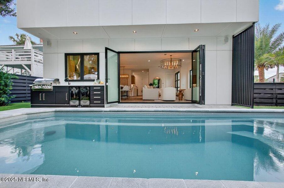 Exterior details and patio area of a home in , Neptune Beach (Image 57).