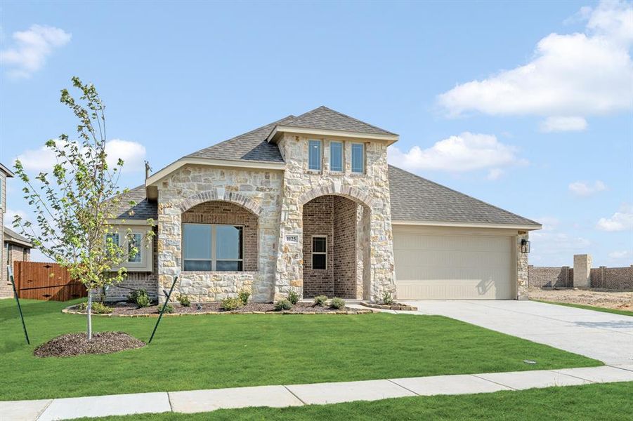 Front exterior of a new home in Hunters Ridge, Crowley, TX, highlighting curb appeal (Image 23). Front exterior of a new home in Hunters Ridge, Crowley, TX, highlighting curb appeal (Image 23).