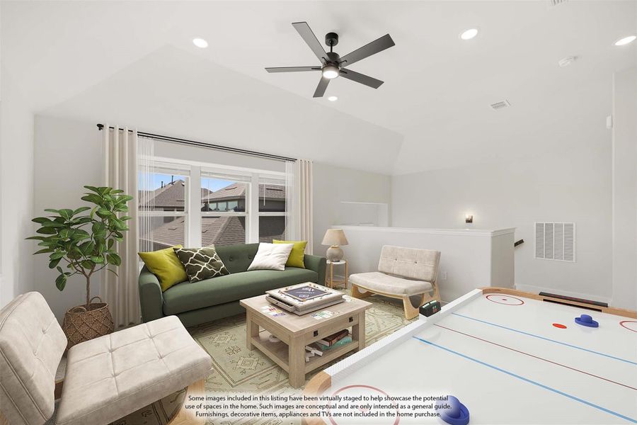 Bonus room with vaulted ceiling, ceiling fan, seating area, and air hockey table