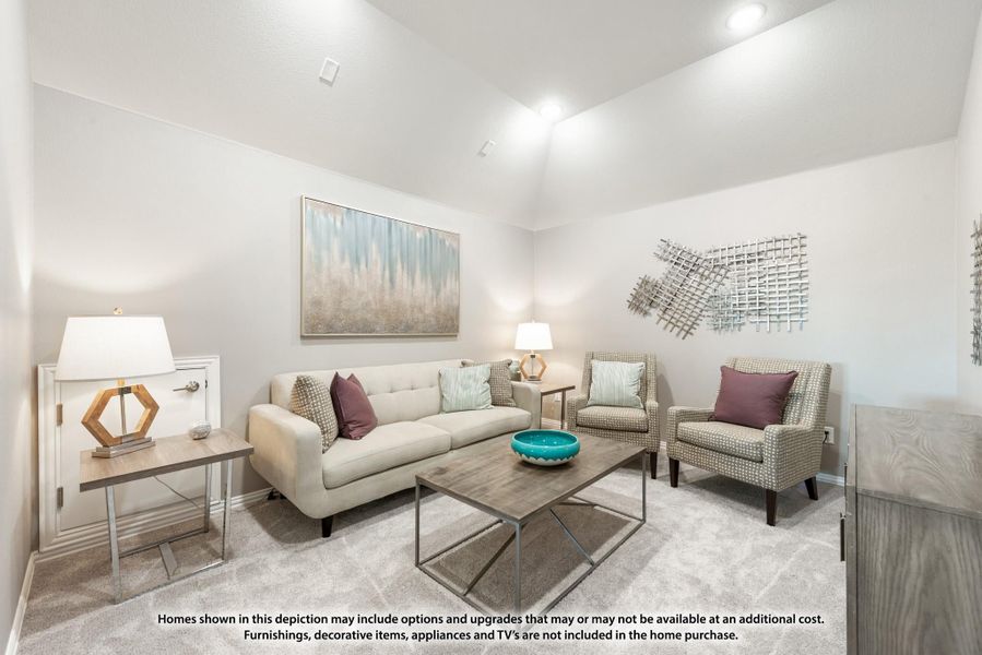 Living room with vaulted ceiling, beige sofa, two accent chairs, and a wood coffee table on carpet flooring