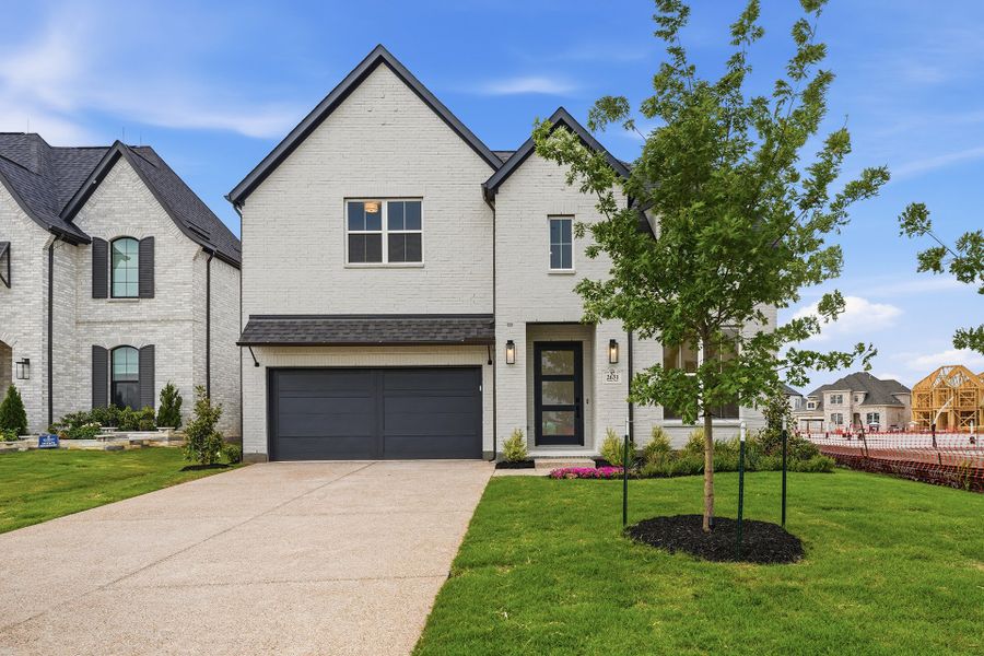 Front exterior of a new home in Brookhollow West, Prosper, TX, highlighting curb appeal (Image 1). Front exterior of a new home in Brookhollow West, Prosper, TX, highlighting curb appeal (Image 1).