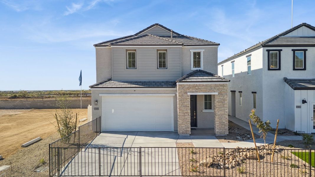 Representative exterior photo of a completed home built from the Mirage by D.R. Horton in The Buttes at Mystic, Peoria, AZ (Image 28).