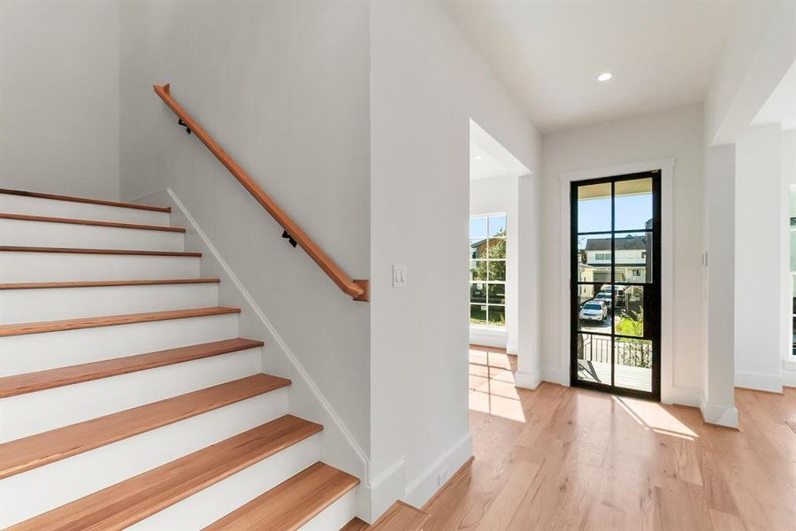 Wood flooring with 8" base boards with outlets