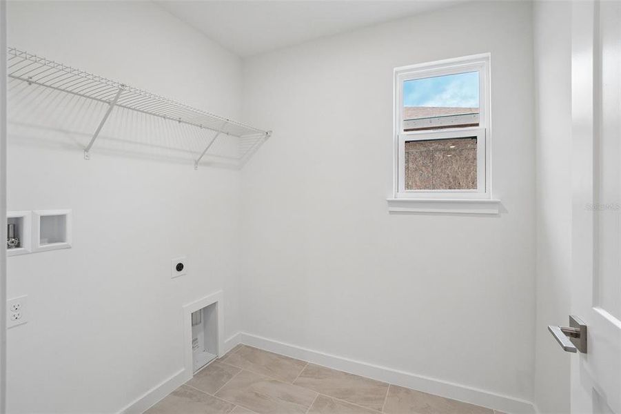 Spacious, unfurnished interior of a new home in Grasslands West, Lakeland (Image 42).