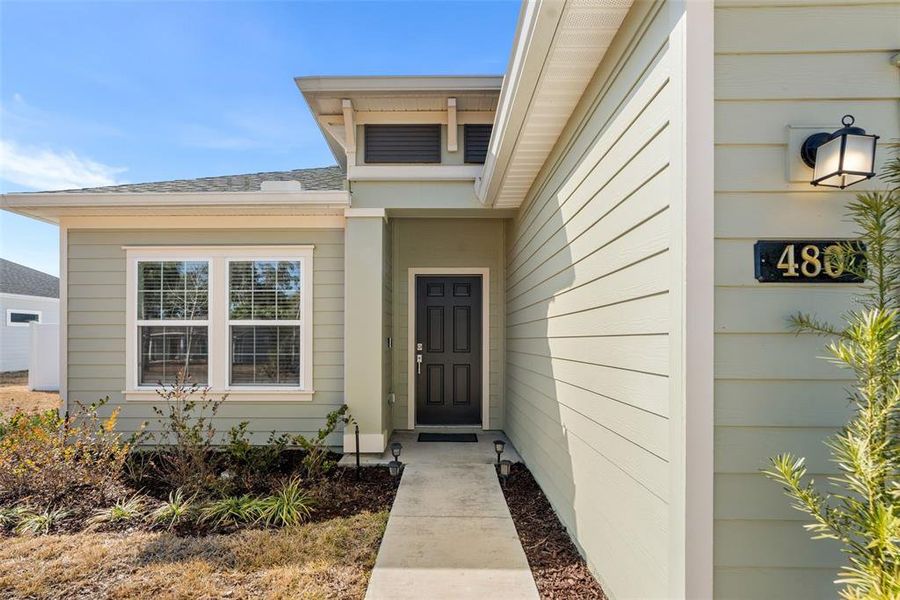 Exterior details and patio area of a home in Country Lane Estates, Williston (Image 23).