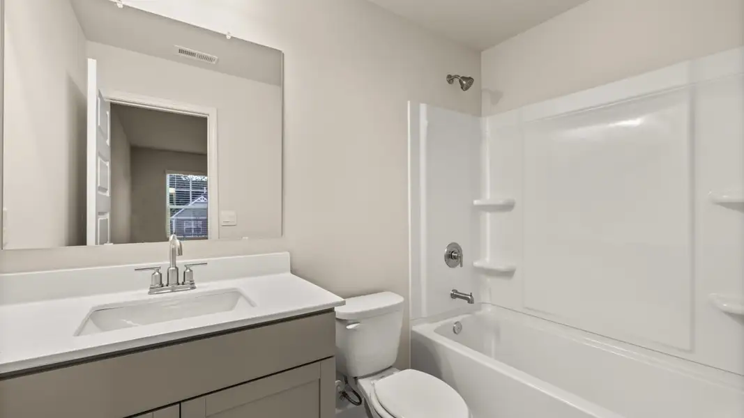 Representative furnished interior of a home built from the Jean Lee by D.R. Horton in Heritage Pointe, Senoia (Image 14).