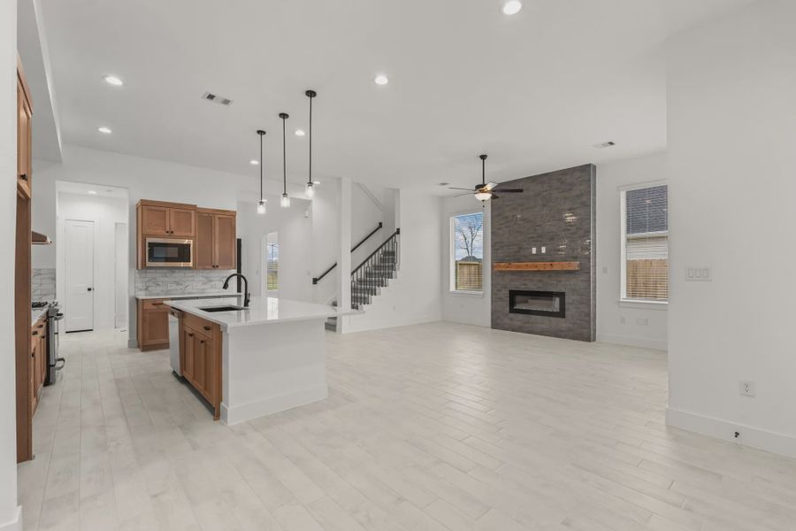 Representative furnished interior of a home built from the Sorenstam by Chesmar Homes in Riceland Alley Loads, Mont Belvieu (Image 49).