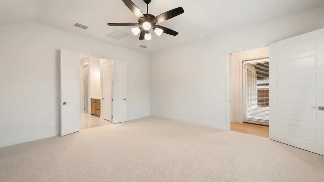 Representative unfurnished interior of a home built from the 2619W by Perry Homes in Revera, Rosenberg (Image 10).