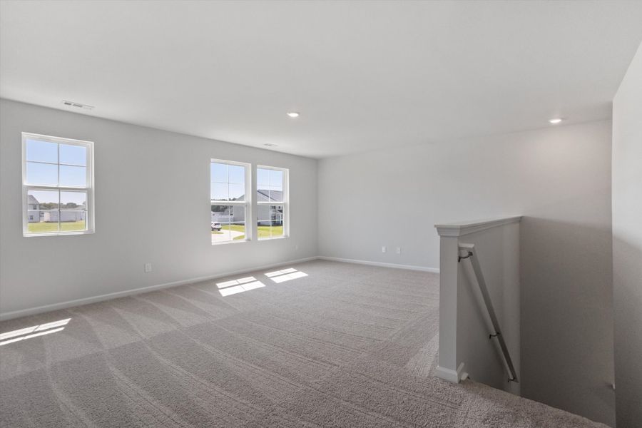 Spacious, unfurnished interior of a new home in Cambridge Reserve, Angier (Image 23).
