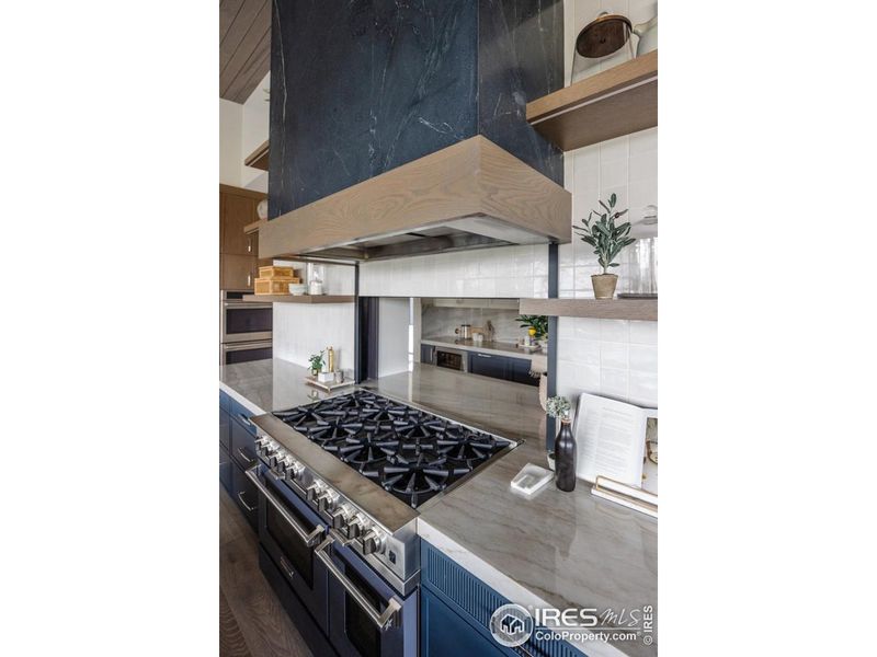 CONCEPT ONLY - PIC NOT OF ACTUAL HOME. Concept of pass-through window behind Range to Scullery CONCEPT ONLY - PIC NOT OF ACTUAL HOME. Concept of pass-through window behind Range to Scullery