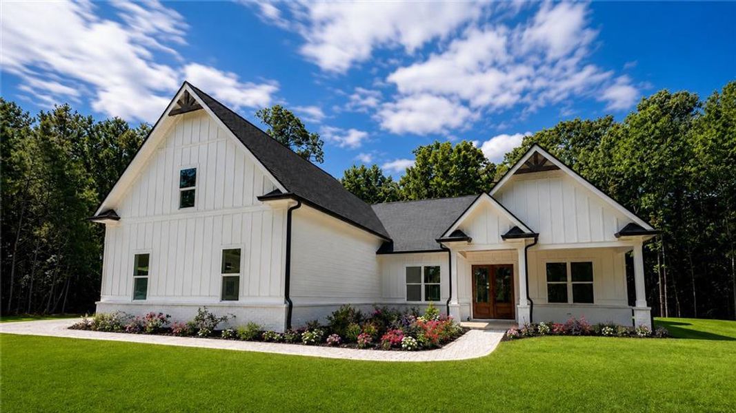 Front exterior of a new home in , Jasper, GA, highlighting curb appeal (Image 1). Front exterior of a new home in , Jasper, GA, highlighting curb appeal (Image 1).