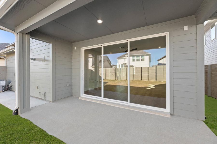 Exterior details and patio area of a home in Garden Collection at Harvest, Argyle (Image 3).