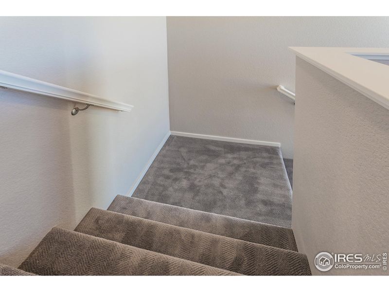 Furnished interior view inside a new home in Trailside Alley Load - Single Family Homes, Timnath (Image 7).
